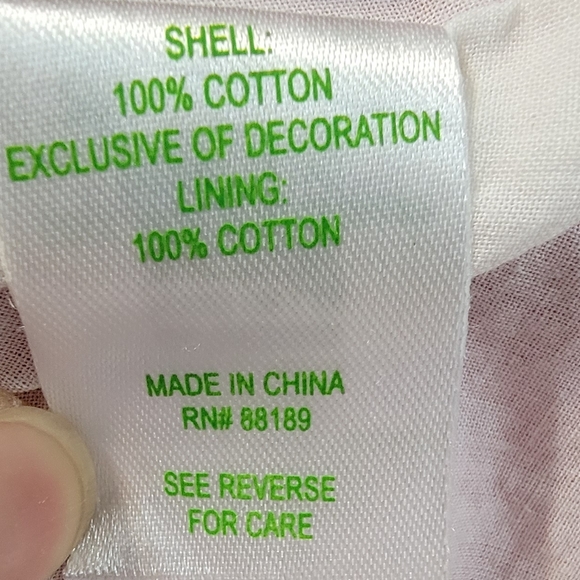 Embroidered cotton piqué dress. - Picture 9 of 9